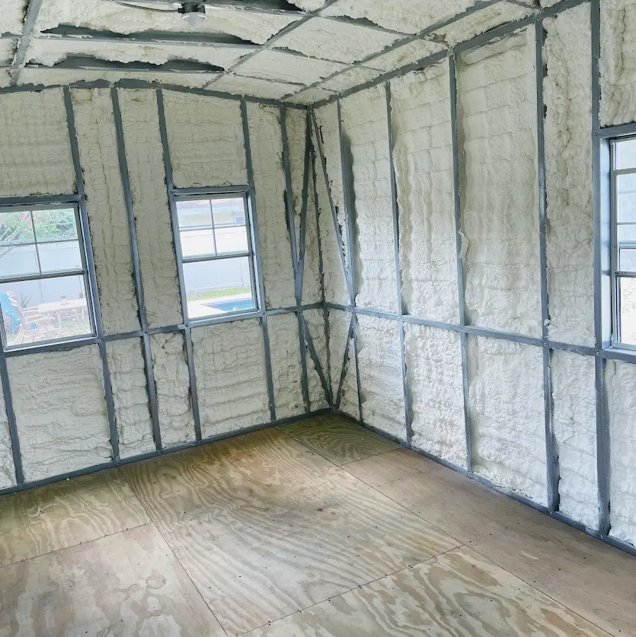 Closed-cell spray foam insulation applied to wall cavities in a residential project in Wappinger